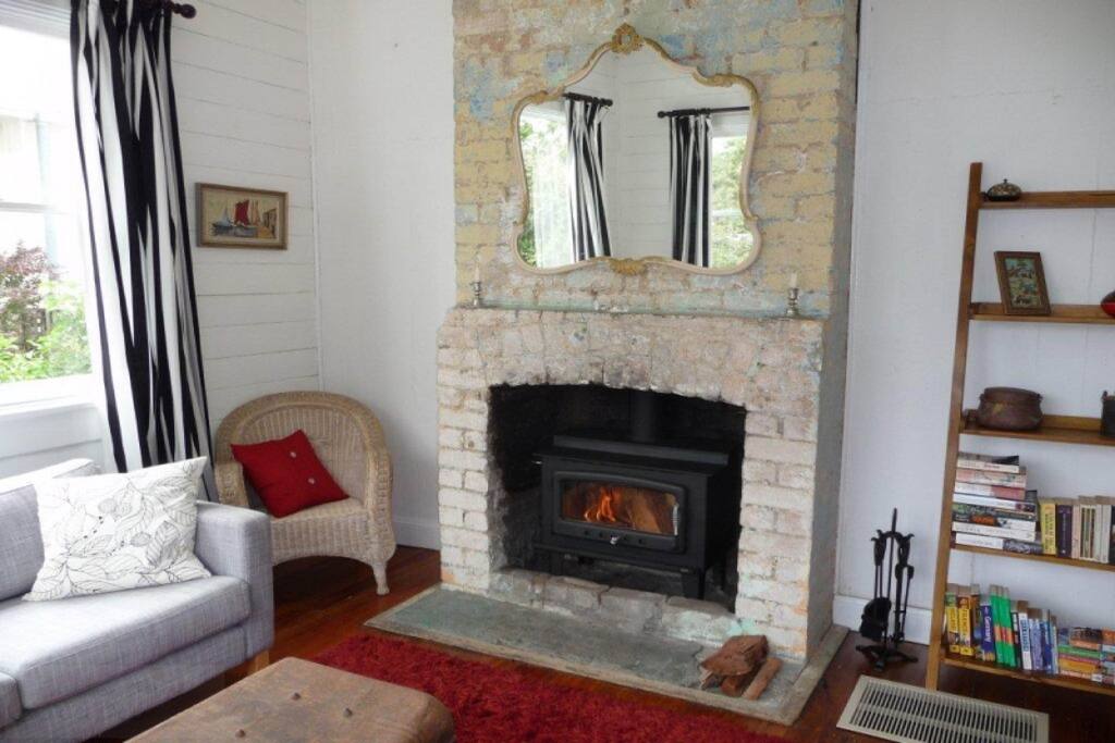 Living area with slow combustion fire