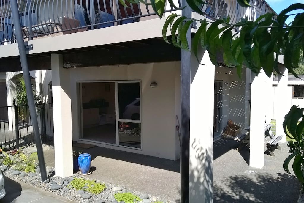 View of entrance to your apartment from garden and patio area