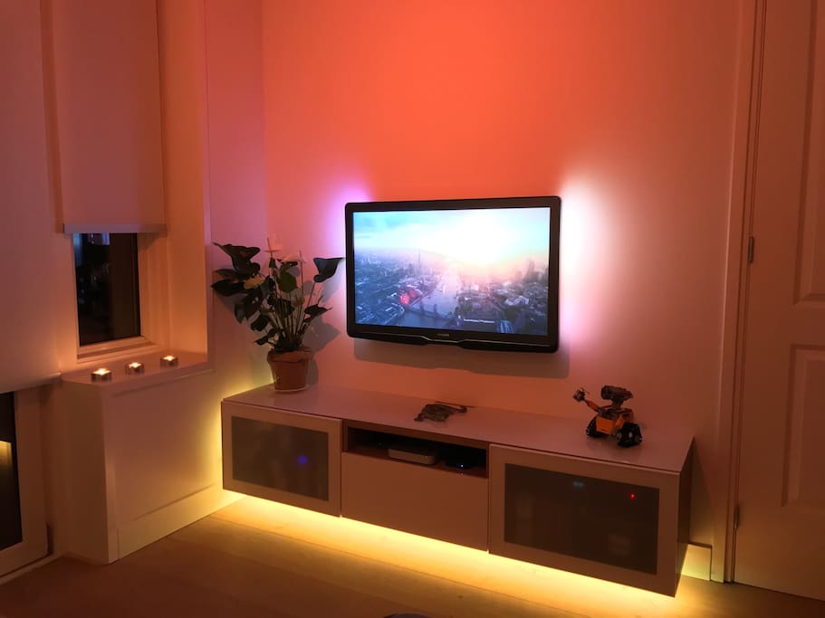 Entertainment unit: HD TV, Digital Cable, Apple TV.