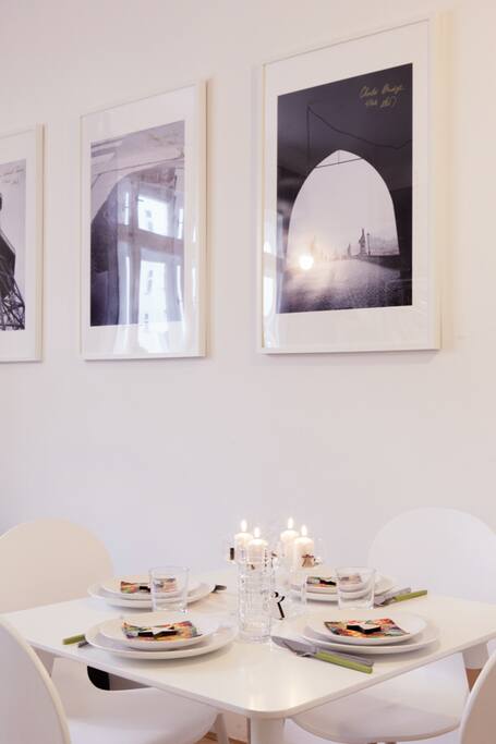 Table for 4 decorated with wonderful photos of Prague