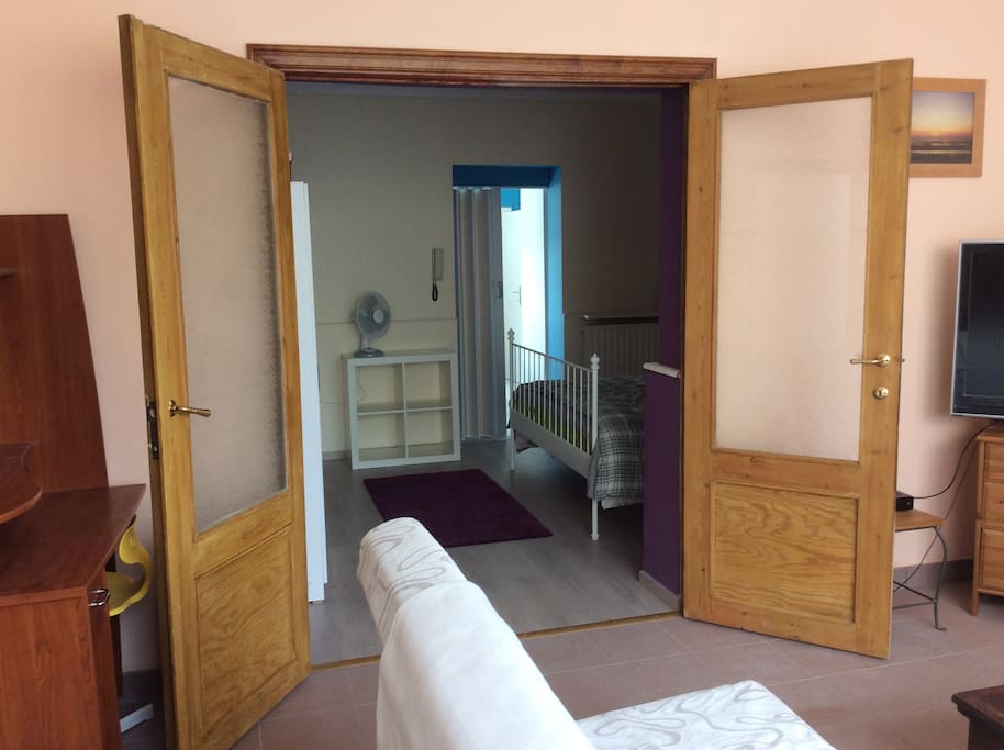 French doors leading to bedroom.