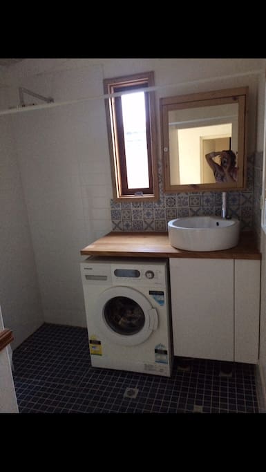 A second shower is available in the laundry