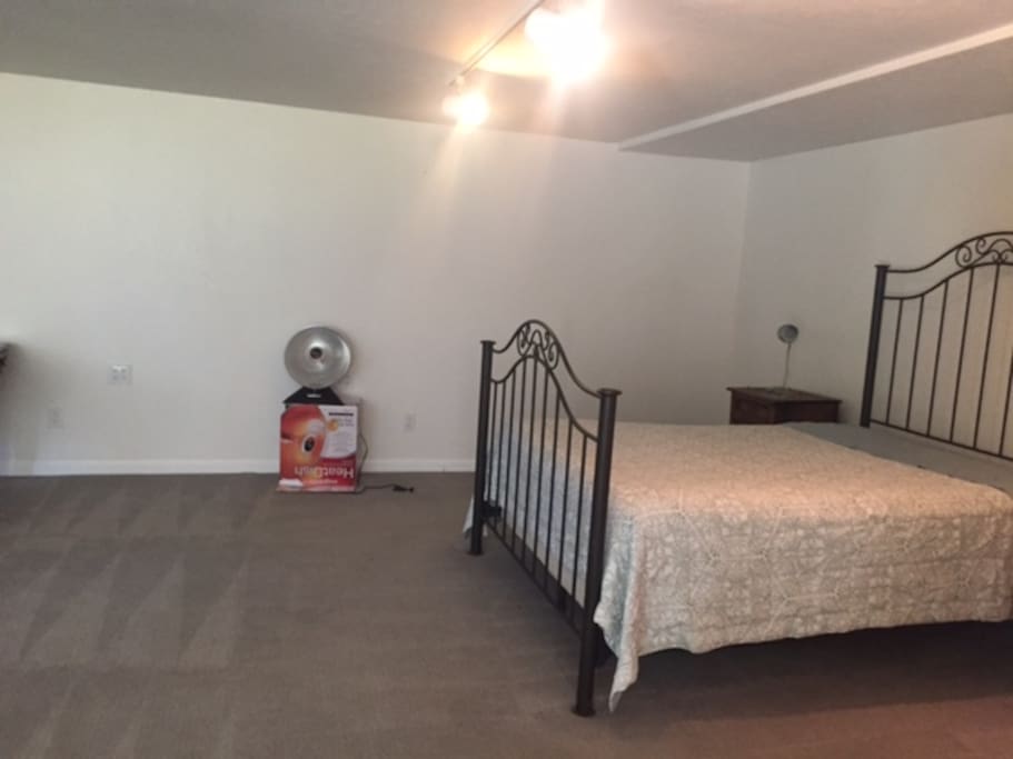 Luxurious queen bed provides quiet sleep.