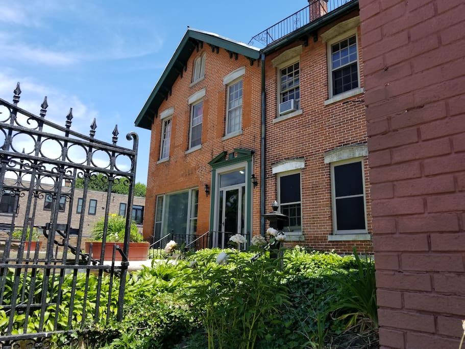 This is a view of the front of the house. This apartment is the upper unit in this picture, the three windows on the left. You look right out on Franklin Street.