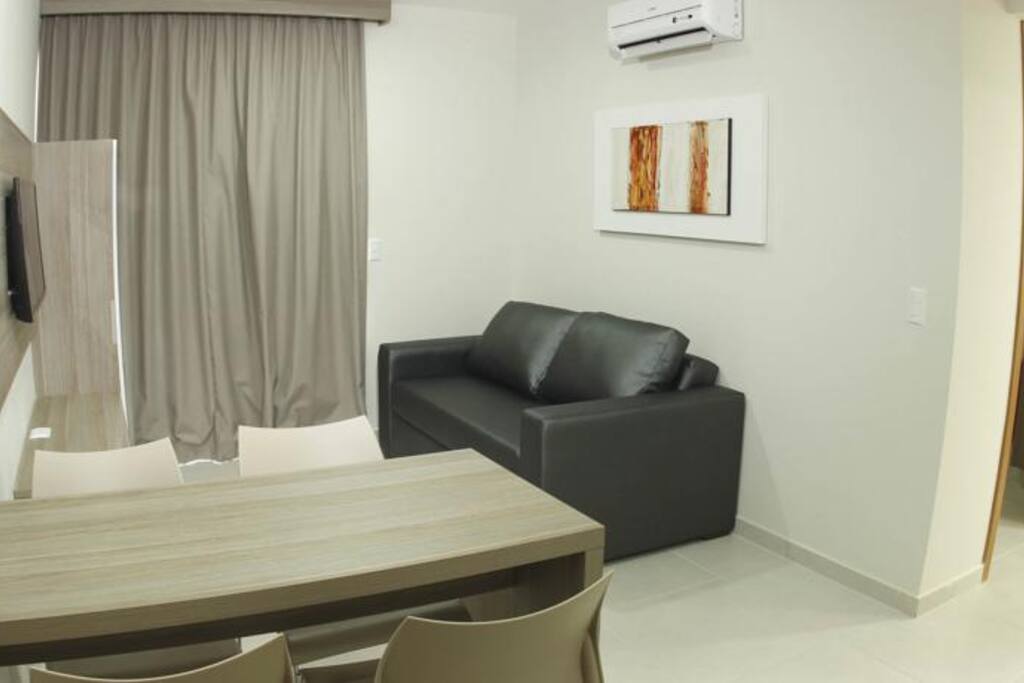 Sala com sofá-cama