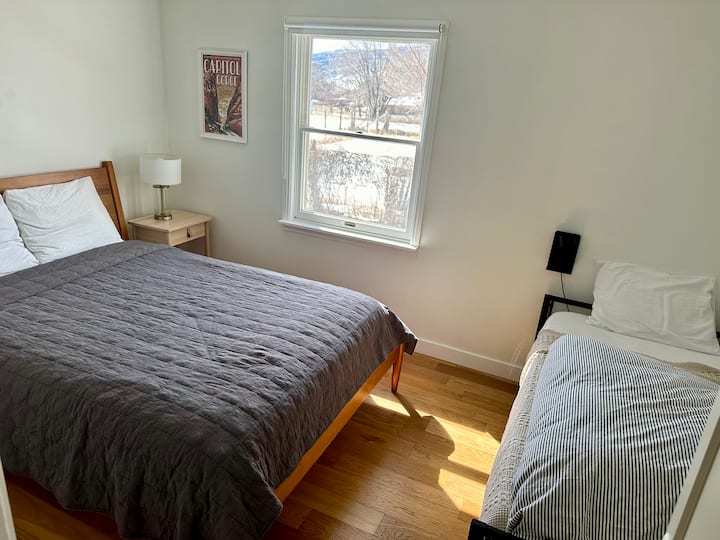 Second bedroom: queen-sized bed and twin daybed. All bedside lamps have USB ports. Room-darkening shade with 3-speed ceiling fan.
