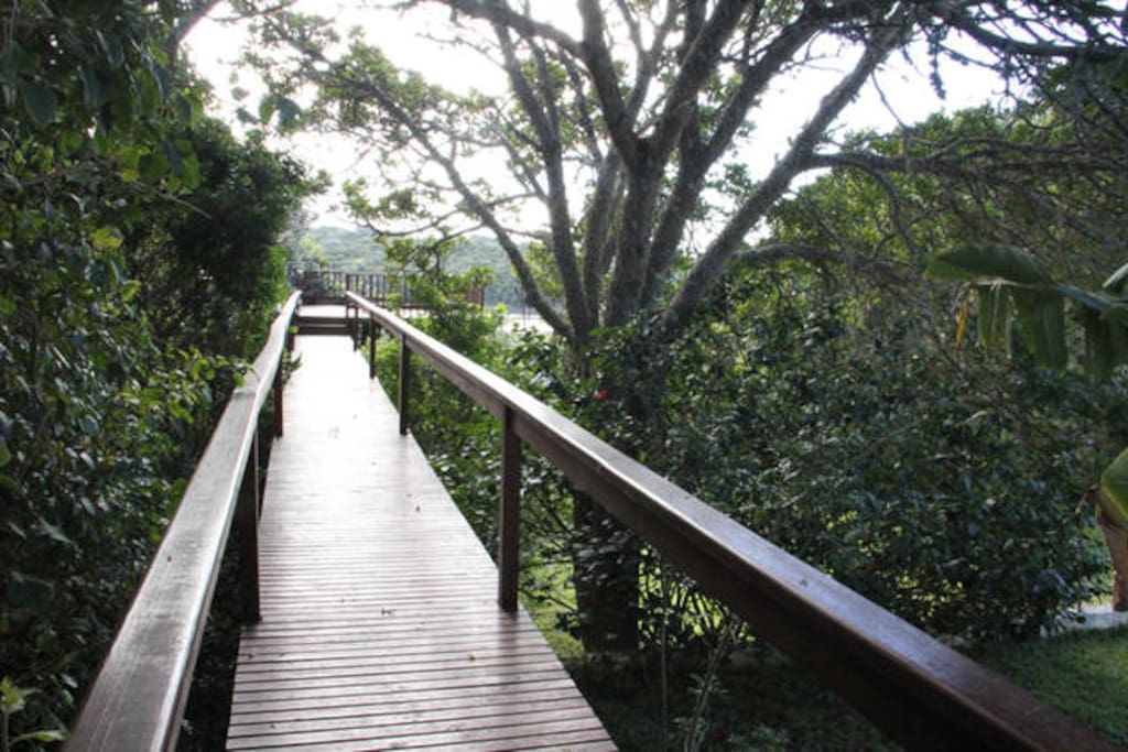 Walkway to outdoor deck from the covered patio