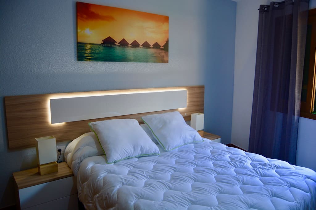 Dormitorio para dos personas.