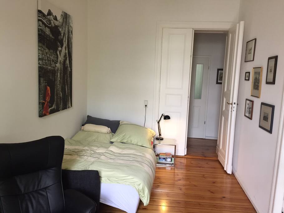 Your large bed and the door to the hallway, in opposite is the bathroom
