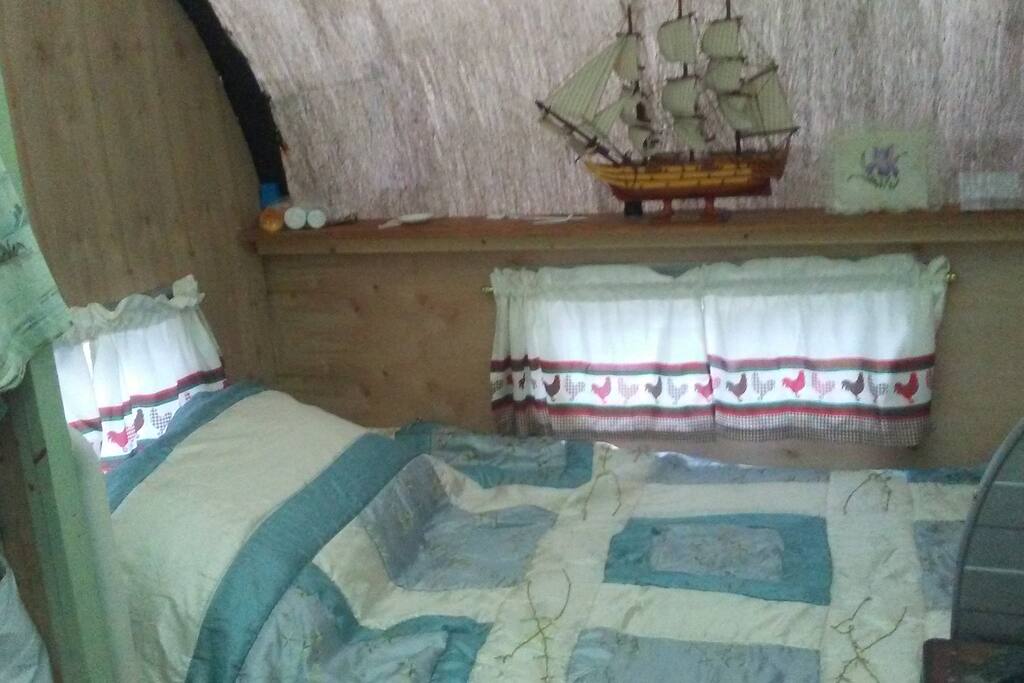 Single (3' x 6' ) comfortable bed .
Large Storage, door opens under bed.