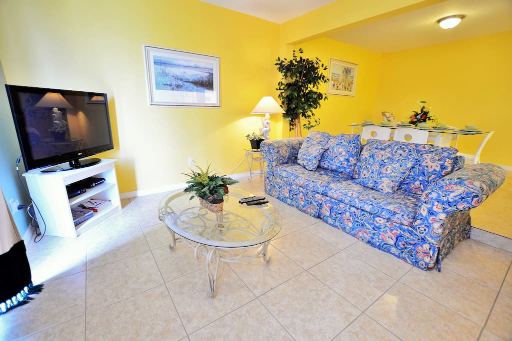 living area with queen sofa bed