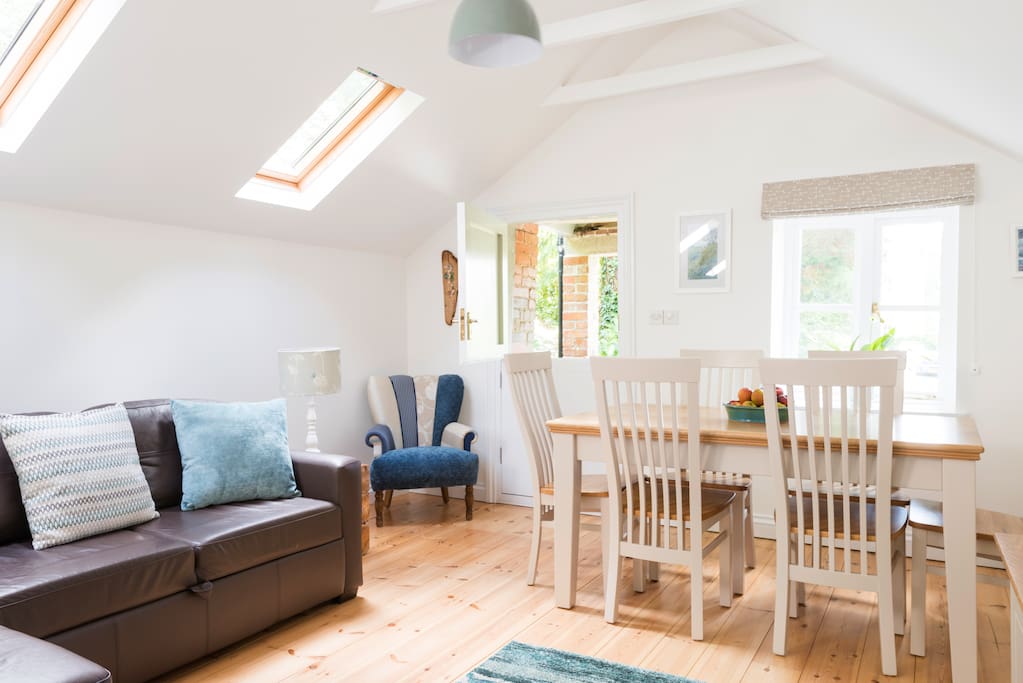 The upstairs, open plan living/dining area