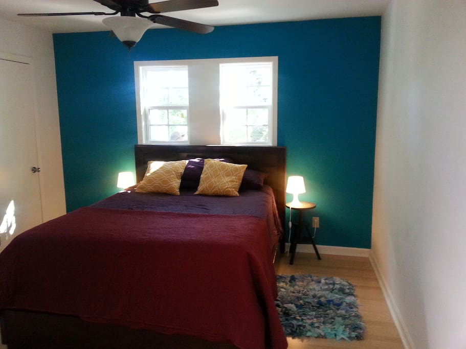 Tranquil view of bedroom with new window and paint.