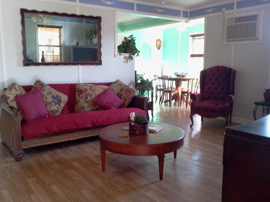 guest house living room with board games, dvd's and vhs libraries for big screen monitor