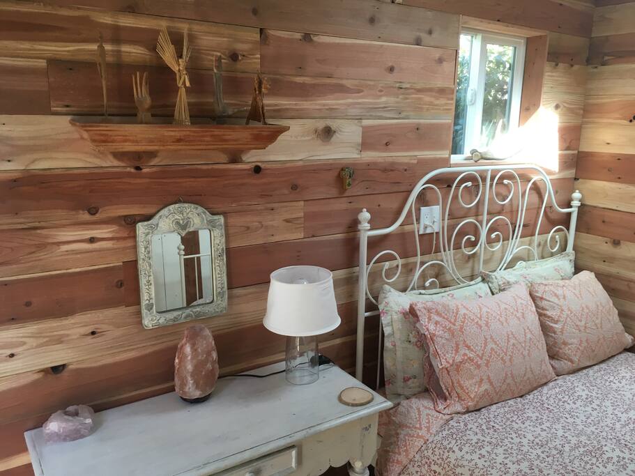 Comfortable full size bed with small desk or space to organize your collected souvenirs!