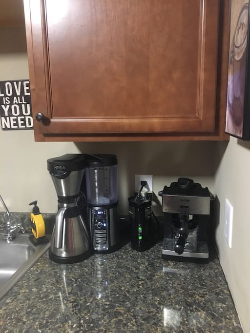 Ninja coffee bar, espresso maker, French press available with coffee beans provided
