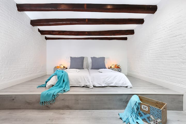 Spacious penthouse bedroom