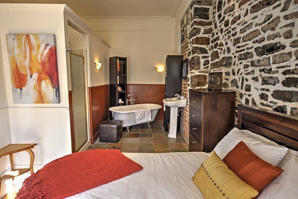 Beautiful exposed brick walls remind you of this condo's rich history.