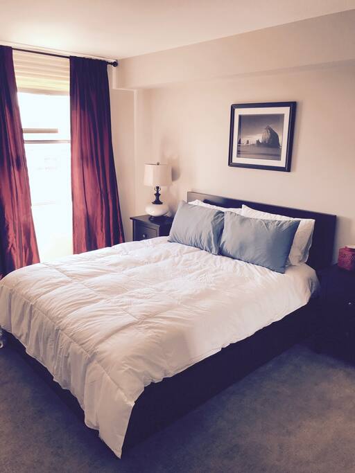 Queen size bed with a high quality mattress.