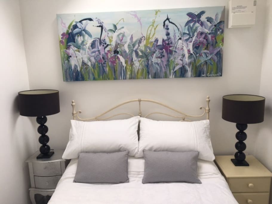 Pretty bedroom with double bed