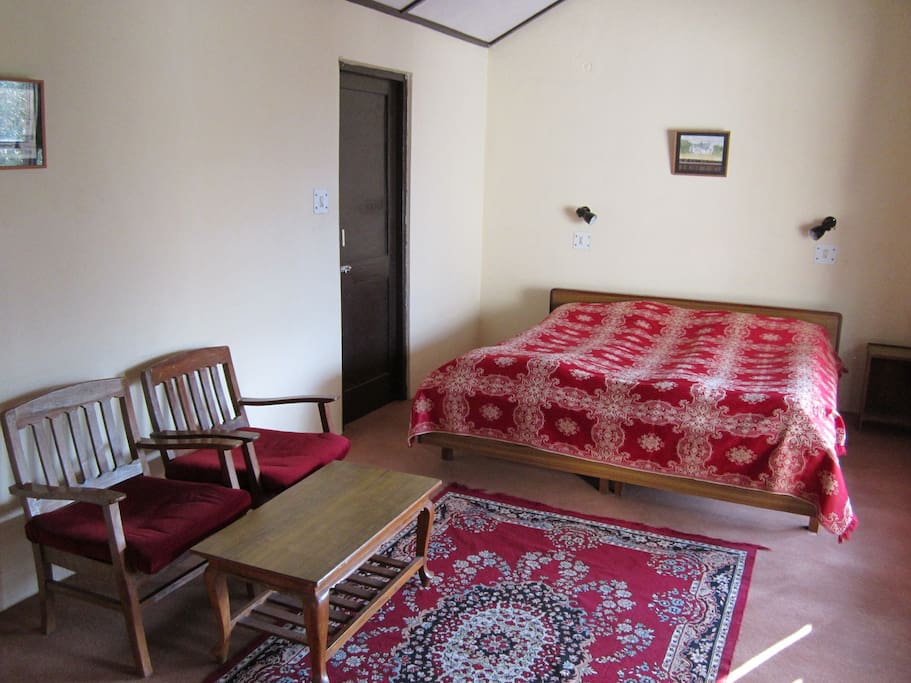 Interiors of the deluxe room with a workdesk and Wi-Fi