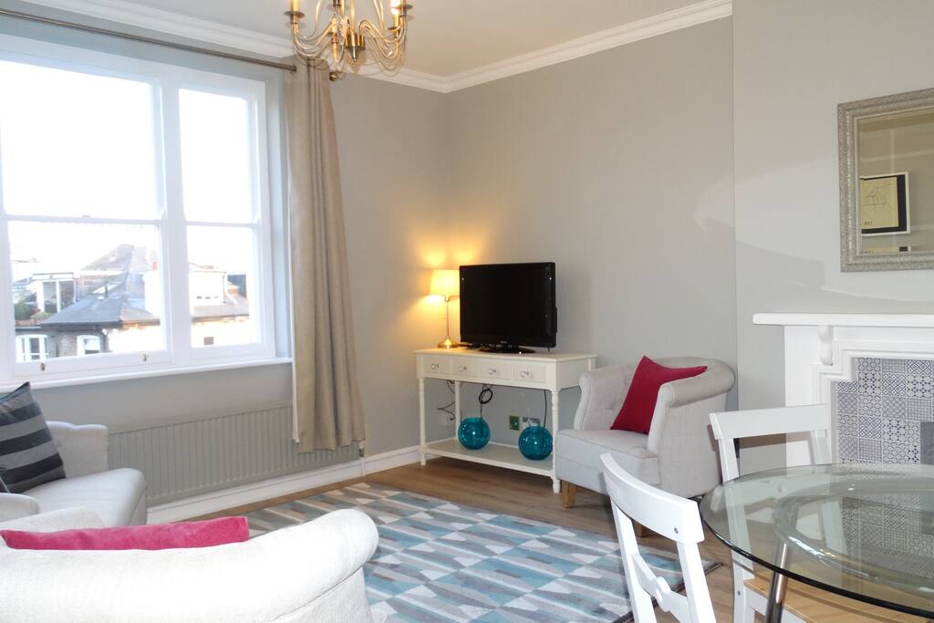 Nice, stylish living room with a fireplace