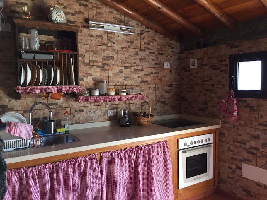 Kitchen equipped with appliances.