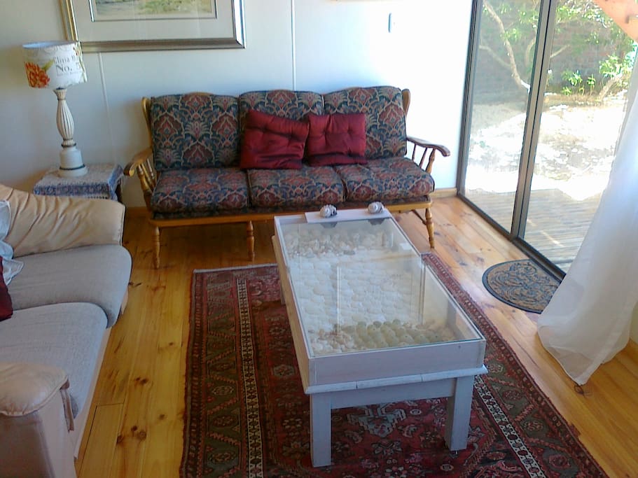 Livingroom with sliding doors onto dune