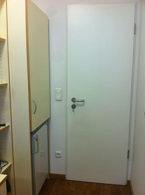 The refrigerador is inside the room