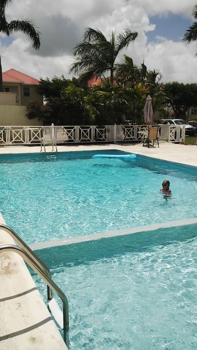 view of swimming pool within compound