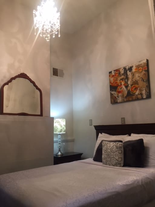 This cozy room is ideal for backpackers, or travelers that need an affordable place to stay. There is a table and chairs not pictured.
