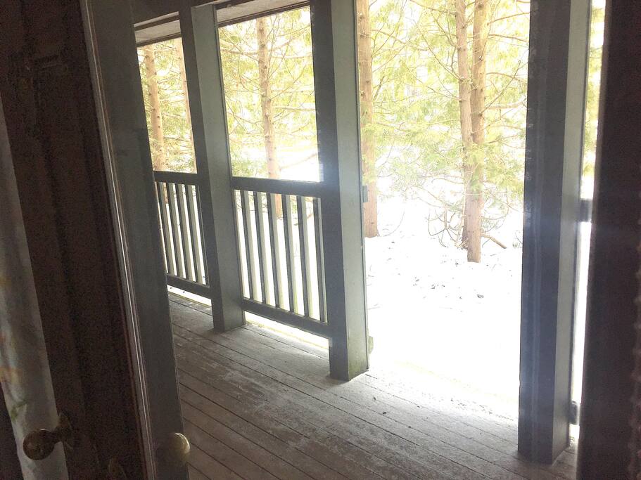 Private covered porch and entrance to room