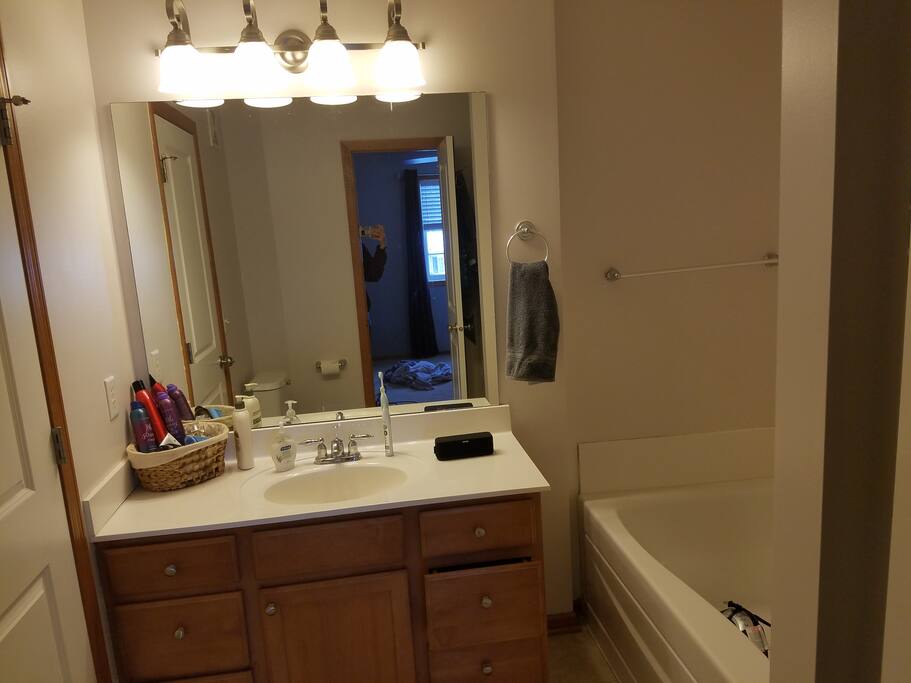 Master bathroom with a tub and shower.