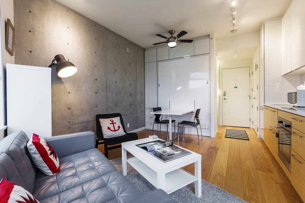 Built-in premium Queen Size wall bed with integrated dining table