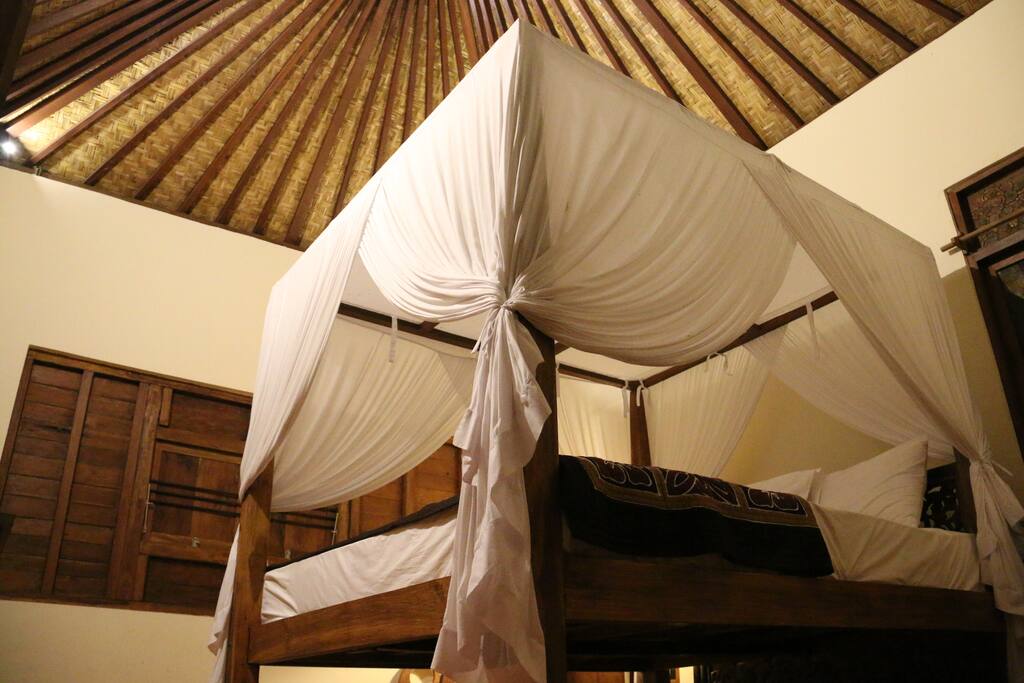 One of the rooms. Both double beds have a mosquito net.