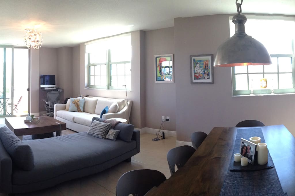 Panoramic Living/Dining Area with Balcony