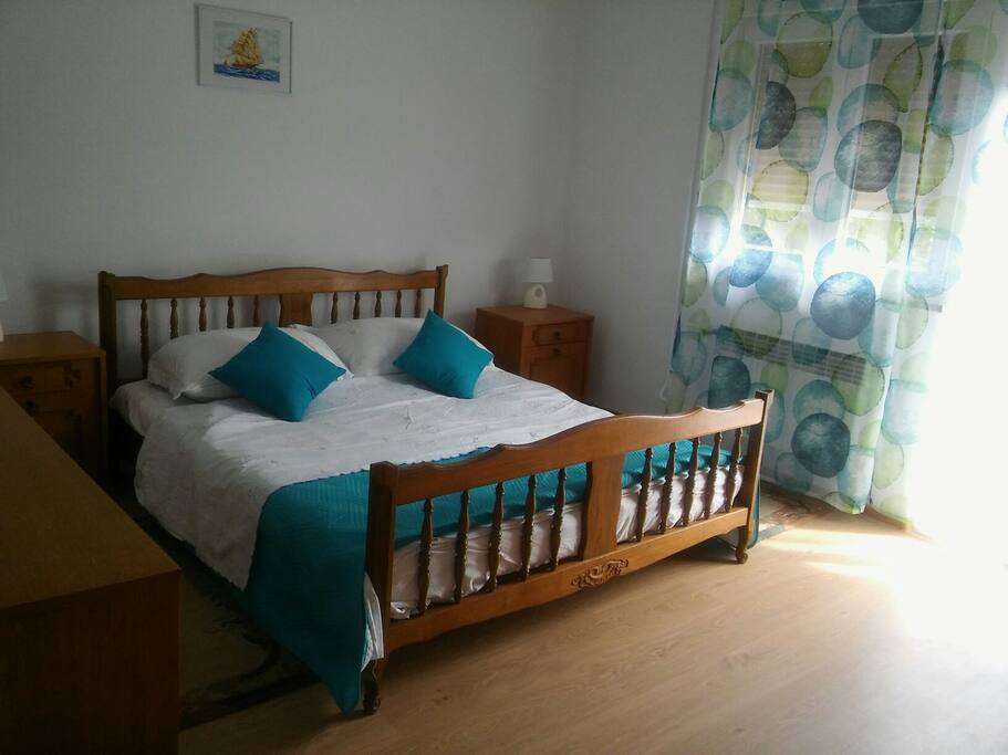 Bedroom blue with a balcony