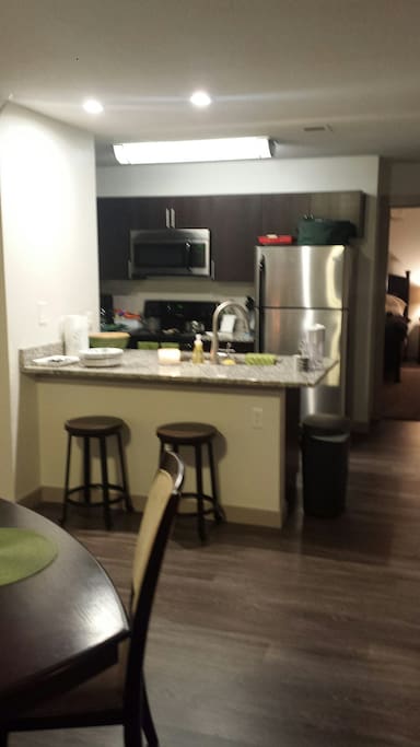 Full Kitchen w/cookware and dishes. Washer dryer room in kitchen area.