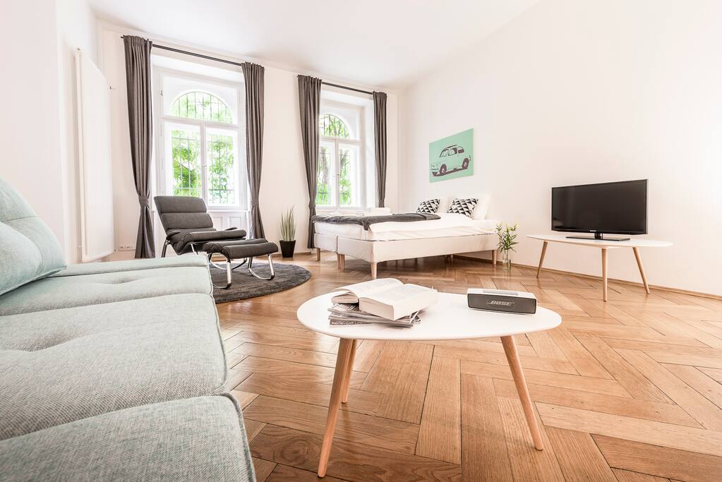 Bedroom w. king size bed (180x200cm), foldable sofa (150x200cm) and TV.