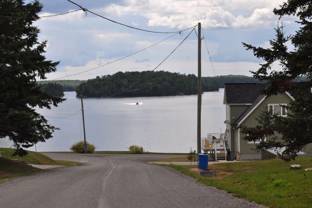 The cottage may be on the hill, but these are all the steps required to get to the water. Just to the right is the government dock. Waters not too cold, jump right in.