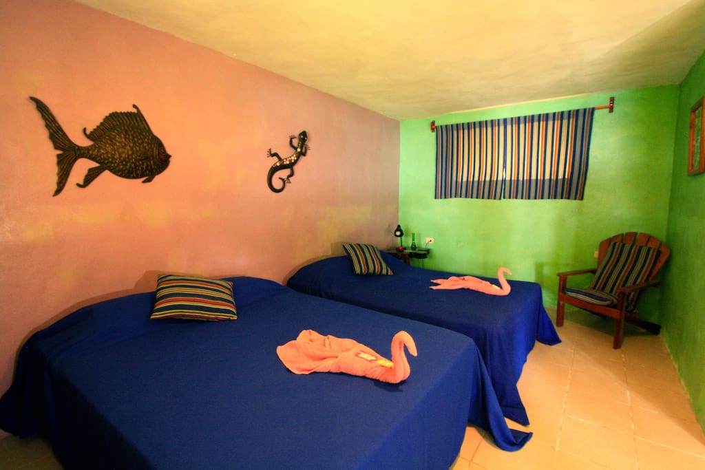 Beautiful bedroom with two double beds.