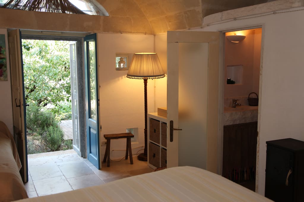 Enjoy the private patio garden from the double doors
