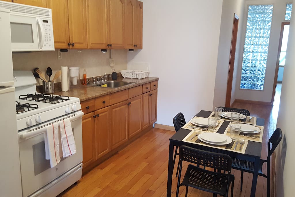 Full service kitchen with a large refrigerator, gas stove and range, lots of storage and all of the amenities to make you feel right at home. French press Bodum coffee pot, Brita water filter and everything you need to cook a great meal at home.