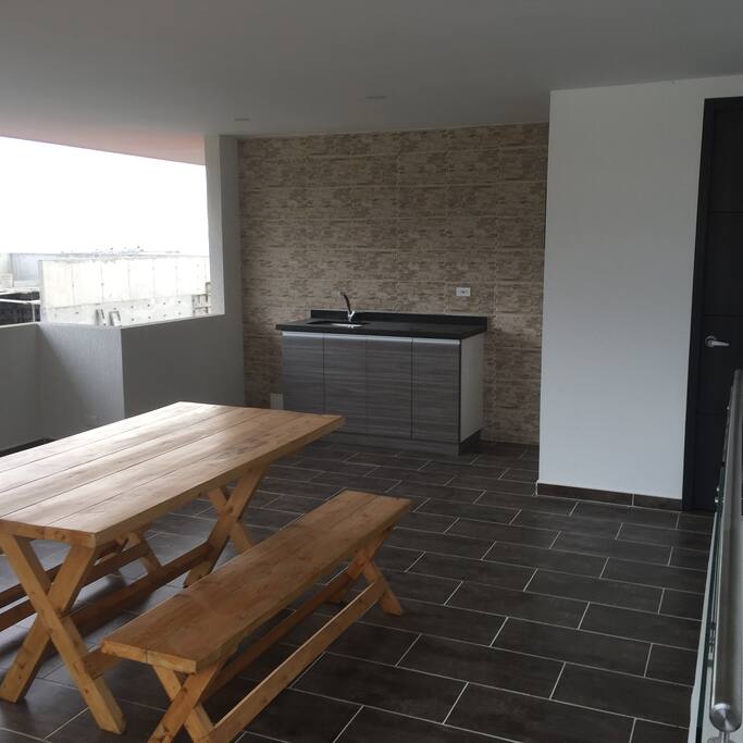 Terraza con comedor auxiliar