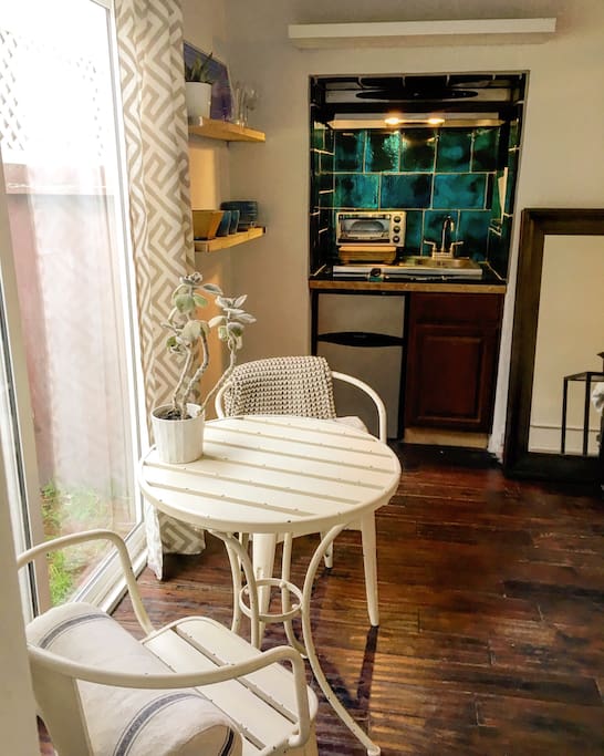 Kitchenette with toaster oven, mini fridge with freezer and coffee maker