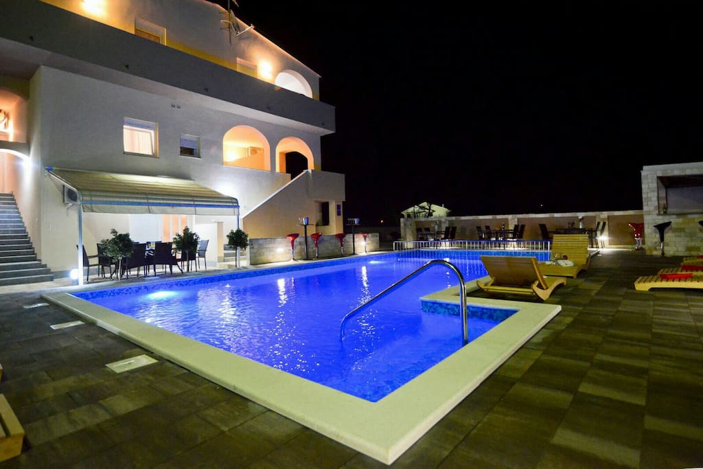 House and swimming pool by night...pool with hydromassage