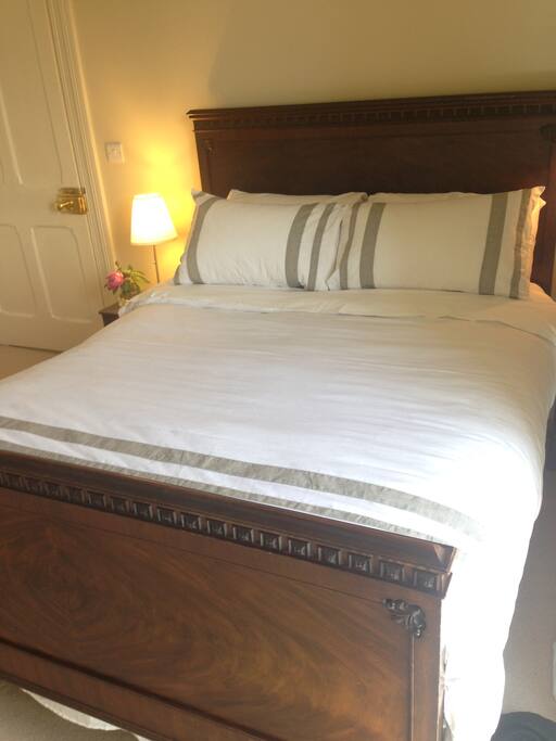 Sleep in a comfortable antique bed.