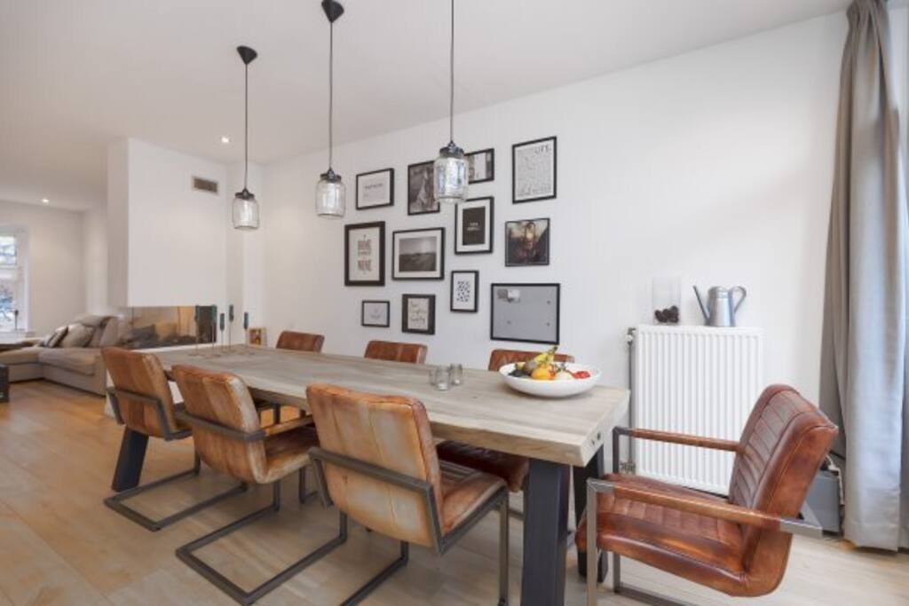 The large dining table is the perfect place to eat, drink, socialize, work, be creative etc.. :)