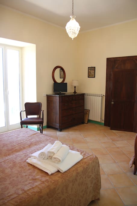 The Bedroom: the comfortable double bed with soft bed-linen and towels