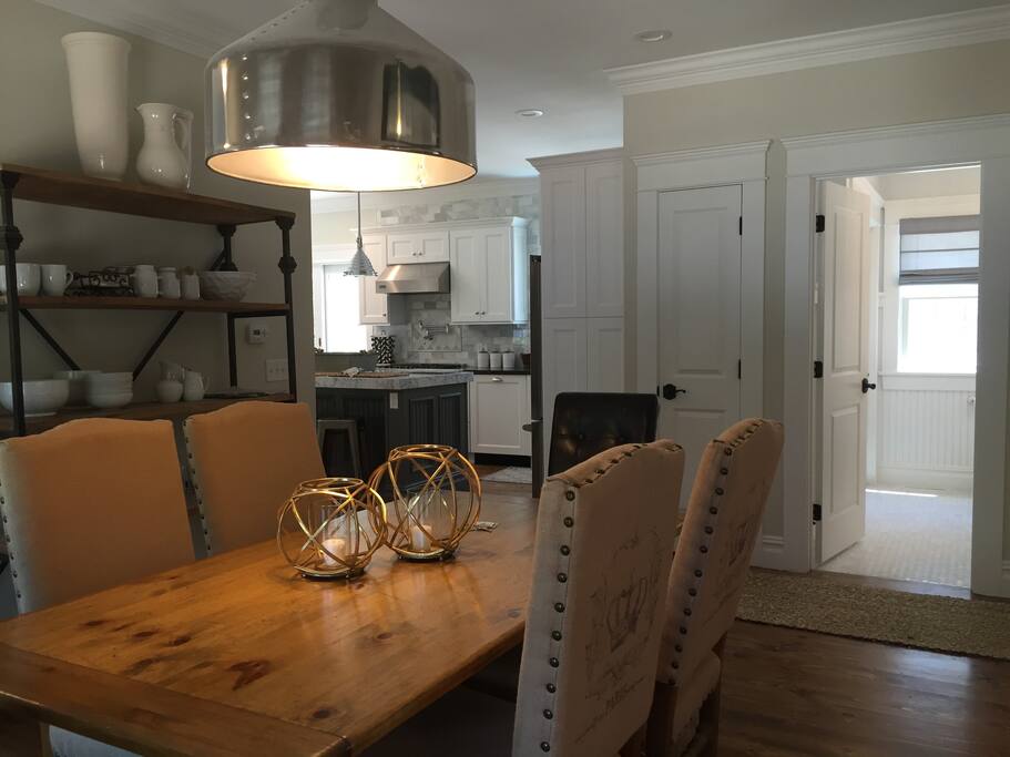 Dining room, first floor bathroom/laundry, and kitchen